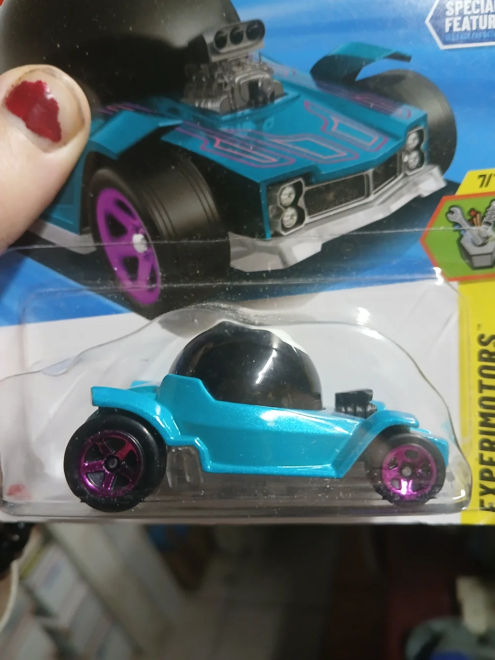 teal Hot Wheels Decidedly Go features a functional Magic 8 Ball design from the